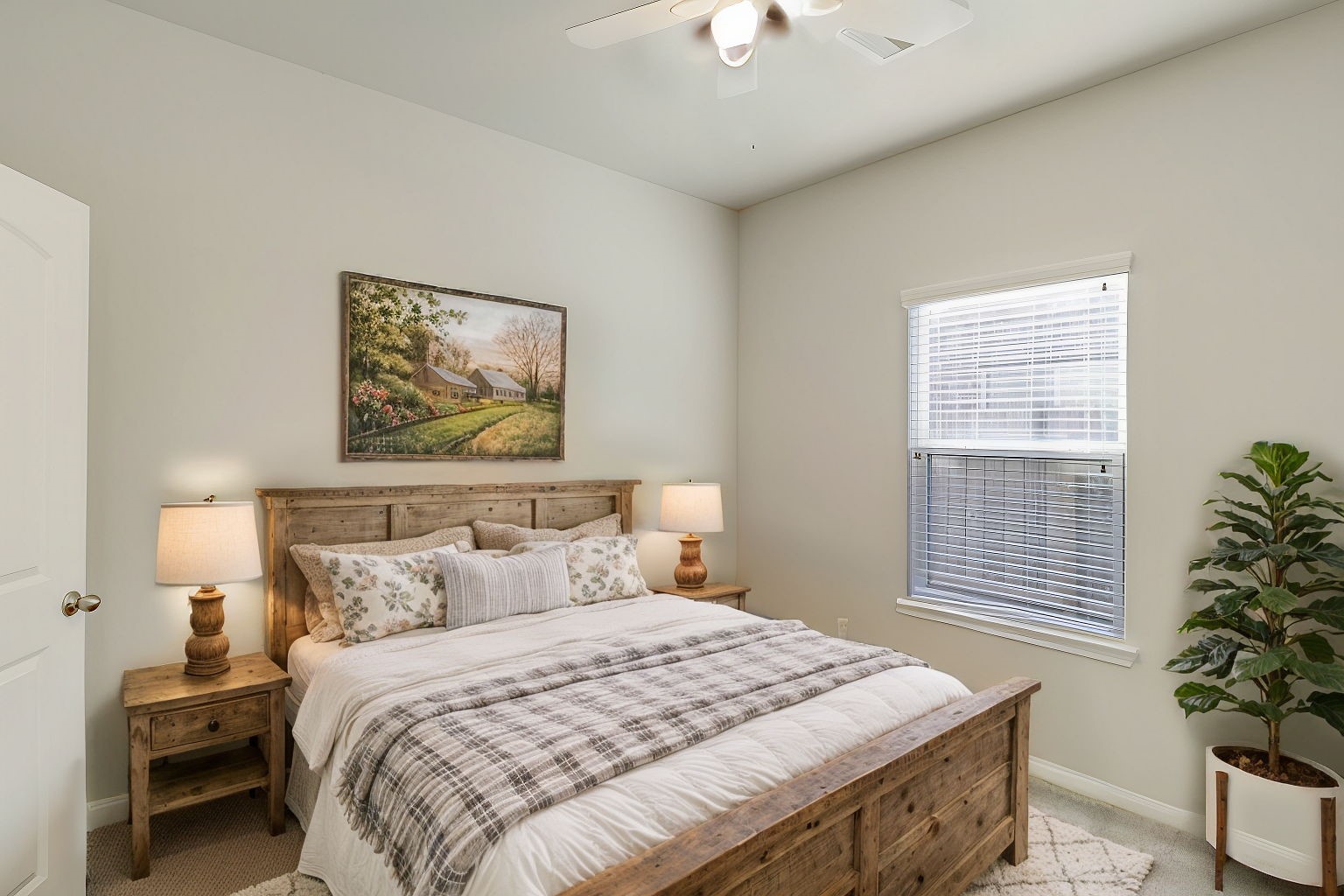 20232 Torrey Pines Lane Cleveland, TX 77327 - Photo 22 of 33 a bedroom with a bed and a painting on the wall