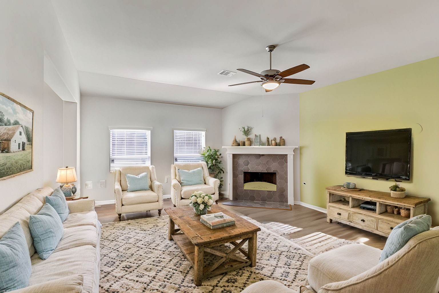 20232 Torrey Pines Lane Cleveland, TX 77327 - Photo 8 of 33 a living room with furniture a fireplace and a flat screen tv