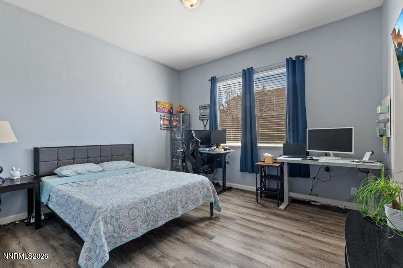 10025 Hampton Park Drive Reno, NV 89521 - Photo 11 of 16 a bedroom with a bed and a desk