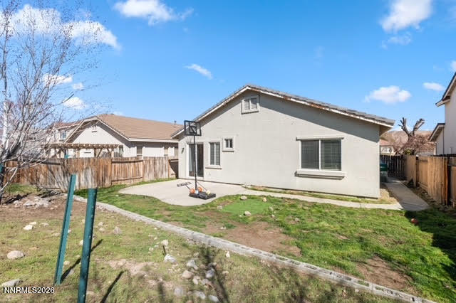 10025 Hampton Park Drive Reno, NV 89521 - Photo 2 of 16 a front view of a house with garden