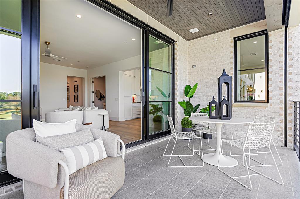 350 O O Connor Ridge Boulevard, Unit 13 Irving, TX 75038 - Photo 11 of 36 Front-row fairway views from your own private outdoor sanctuary!(Photo of model showroom)