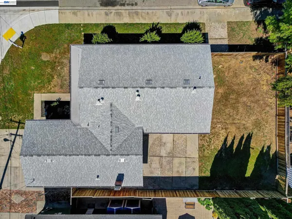 an aerial view of houses with outdoor space