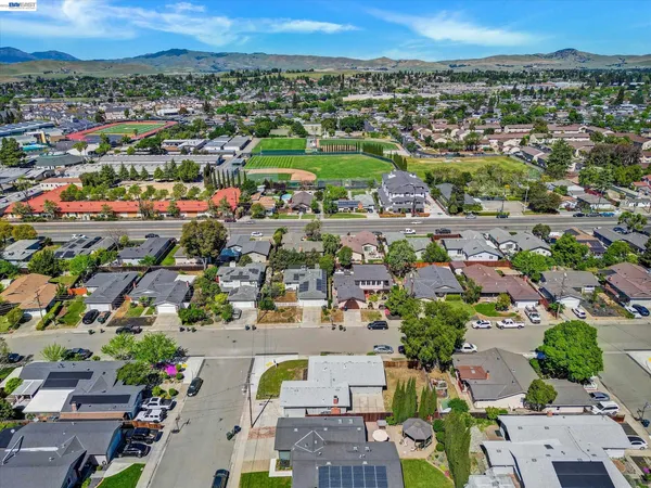 an aerial view of a city with lots of residential buildings