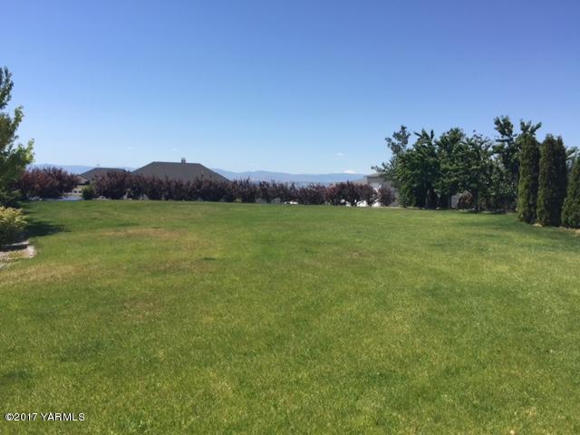 307 Warrior Road Yakima, WA 98901 - Photo 3 of 38 a view of a field with an ocean and trees