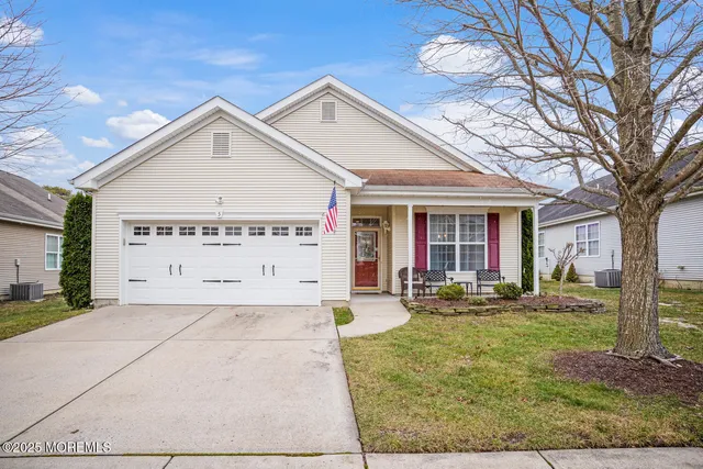 a view of a house with basket ball court and outdoor view