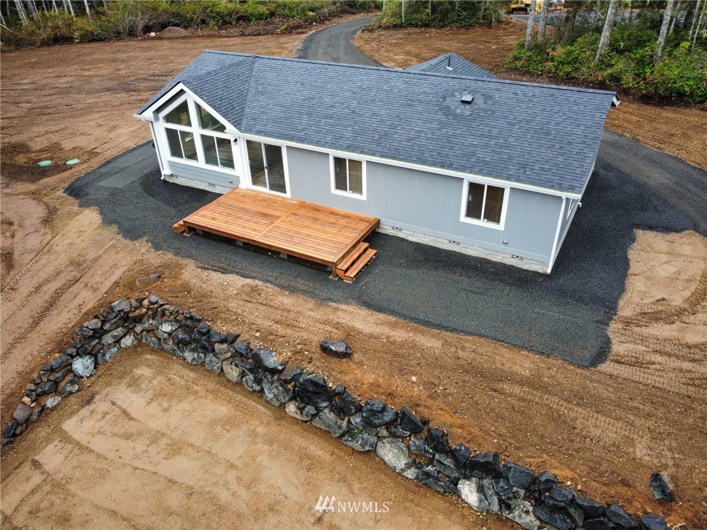 1111 Northeast Hurd Road Belfair, WA 98528 - Photo 4 of 29 an aerial view of a house with a yard