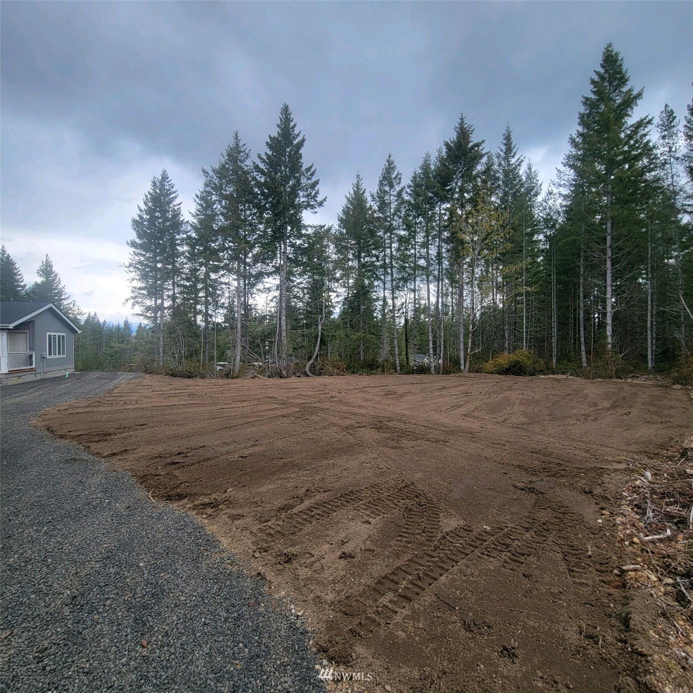 1111 Northeast Hurd Road Belfair, WA 98528 - Photo 7 of 29 a backyard of a house with lots of green space