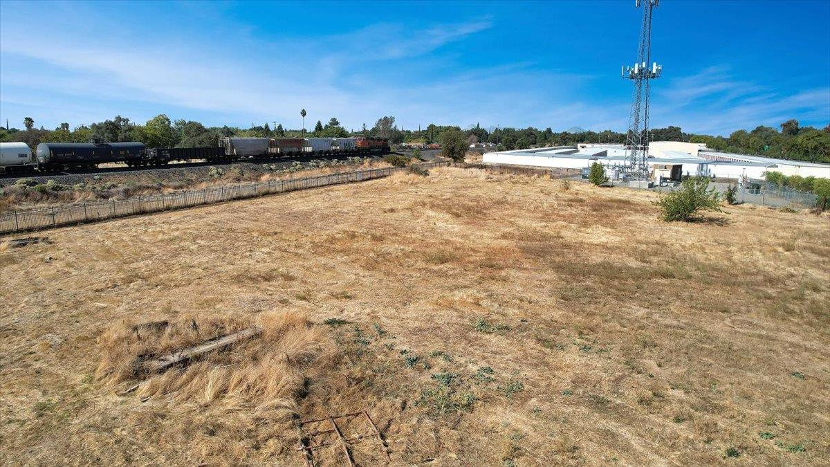 5644 Chestnut Road Olivehurst, CA 95961 - Photo 25 of 25 a view of a lake with houses in the back
