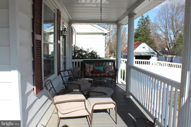 a view of a chairs in the balcony