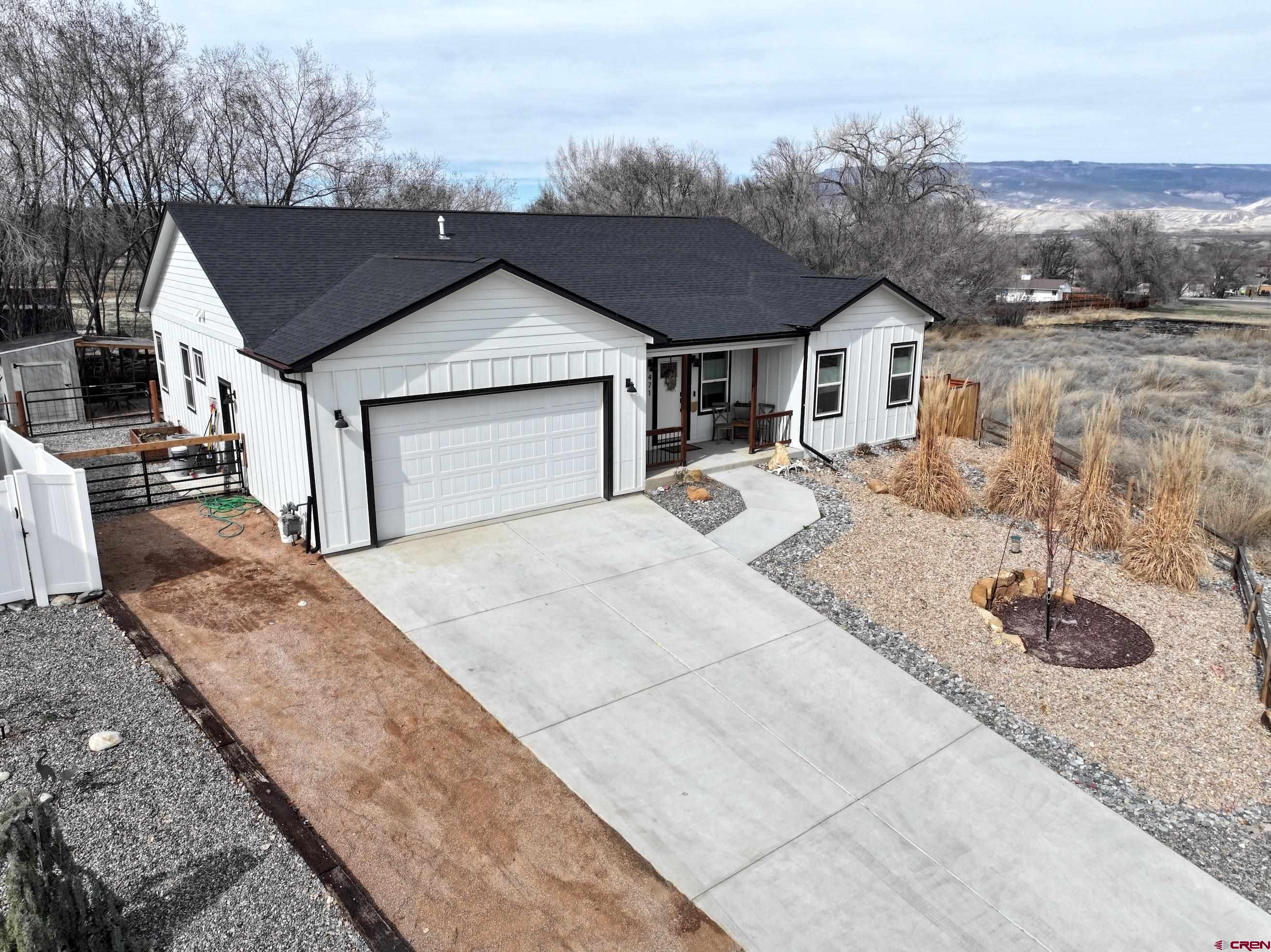 471 River Valley Court Delta, CO 81416 - Photo 3 of 31 a view of house and outdoor space
