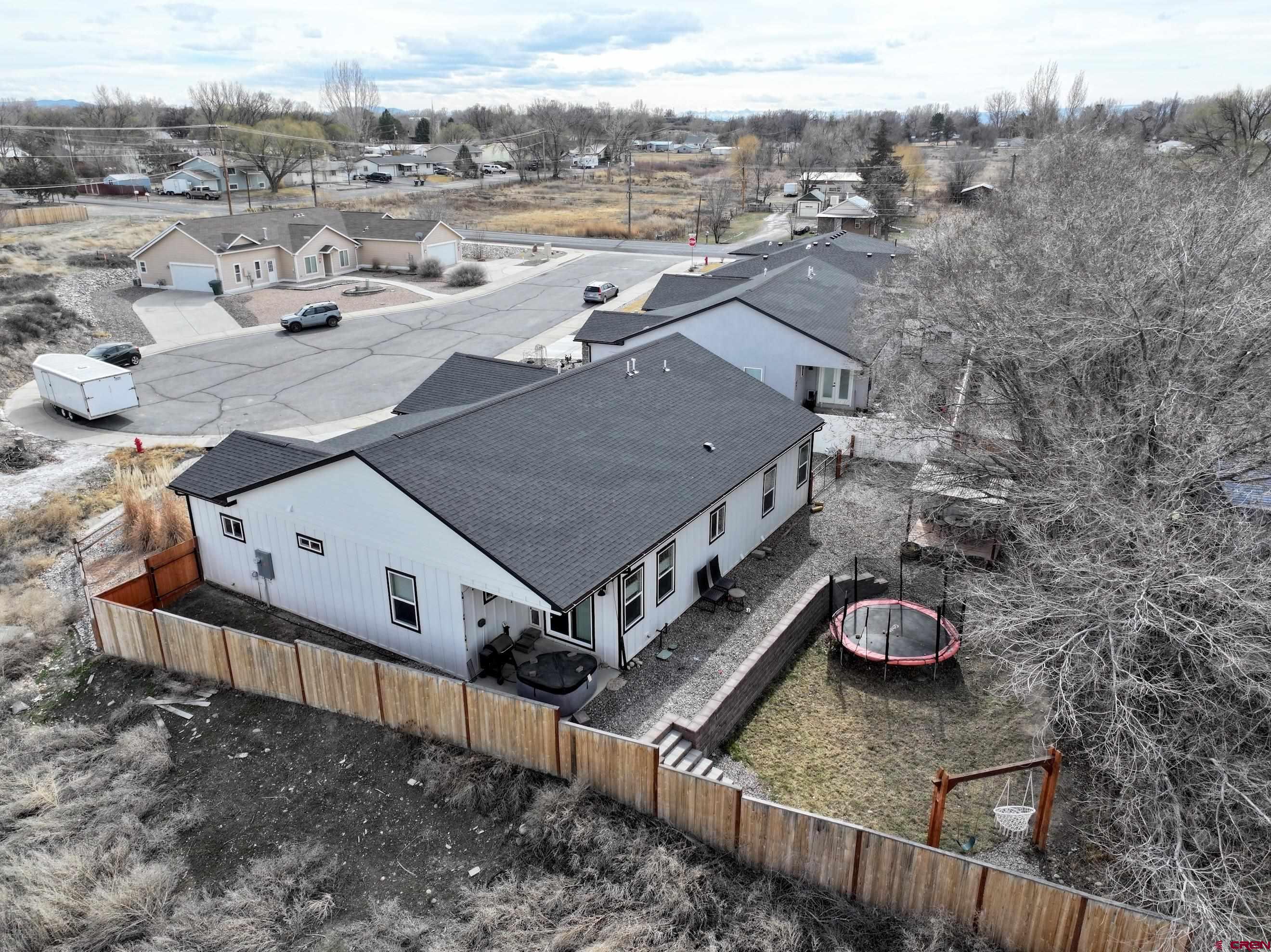 471 River Valley Court Delta, CO 81416 - Photo 5 of 31 an aerial view of a house with a yard