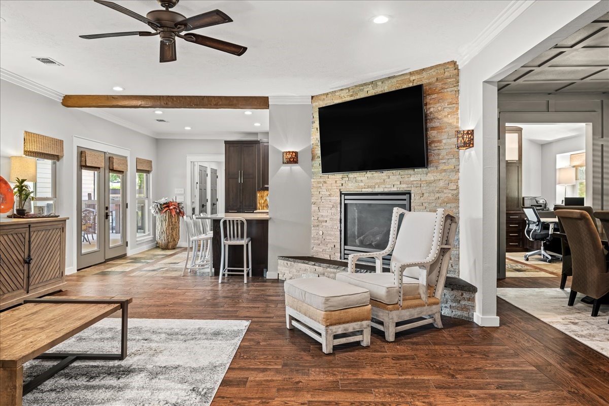 1502 Reimer Street Brenham, TX 77833 - Photo 2 of 30 a living room with furniture fireplace and flat screen tv