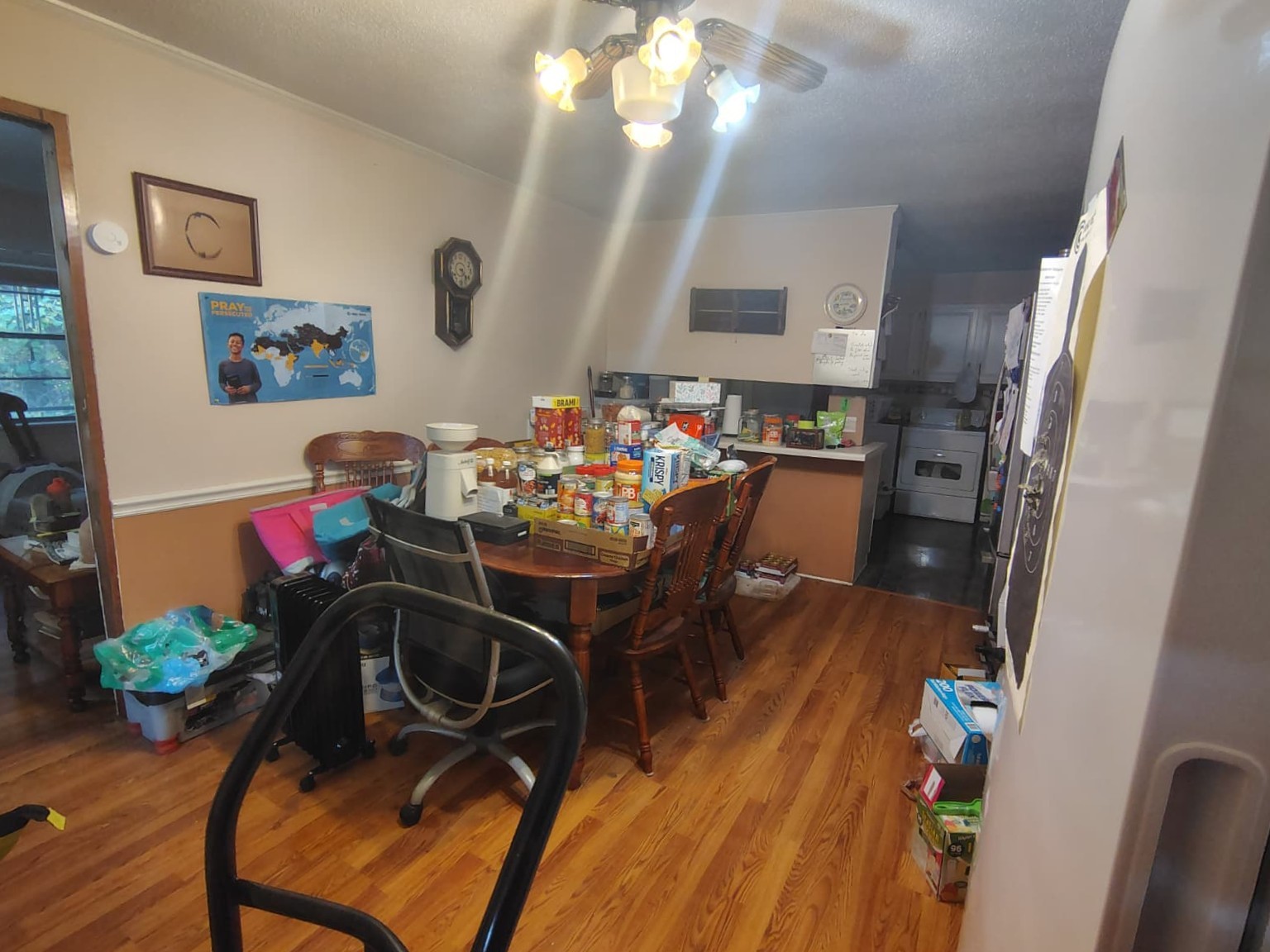 405 Henderson Road Jackson, TN 38305 - Photo 6 of 9 a view of a dining room with furniture and wooden floor