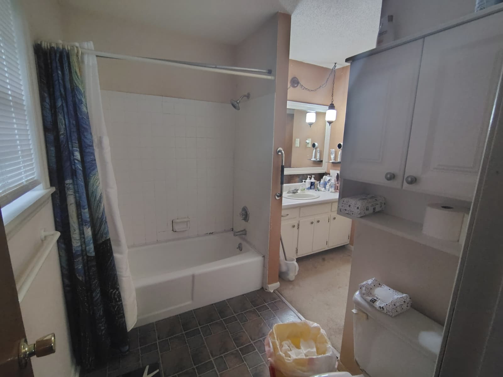 405 Henderson Road Jackson, TN 38305 - Photo 9 of 9 a bathroom with a bathtub sink and toilet