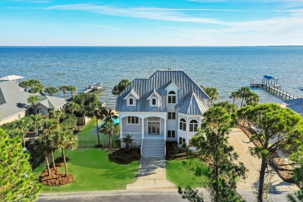 1669 Driftwood Point Road Santa Rosa Beach, FL 32459 - Photo 2 of 8 a aerial view of a house with a garden