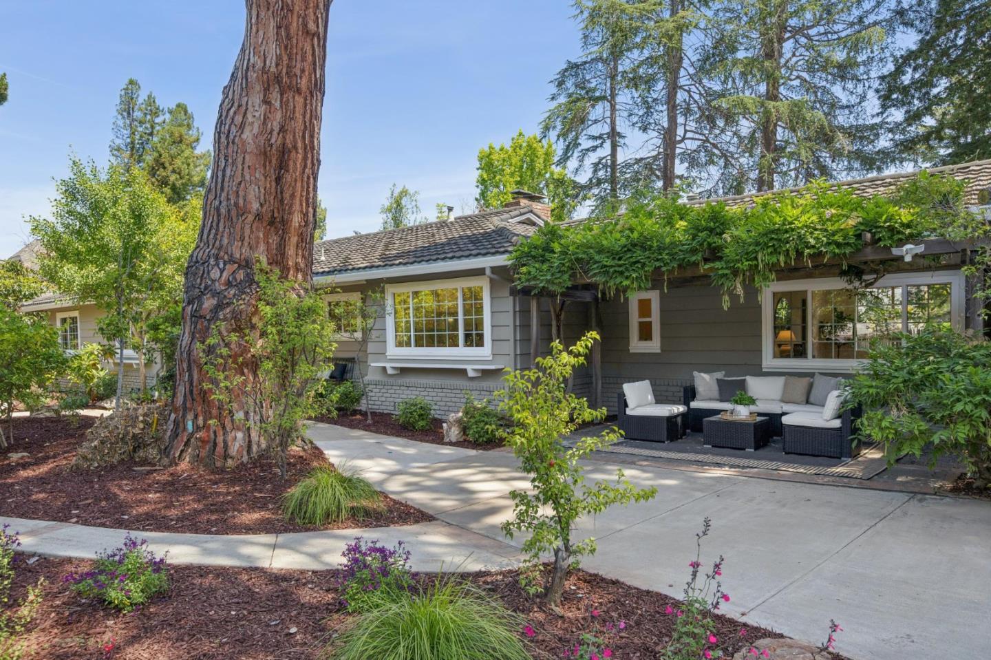 755 Santa Rita Avenue Los Altos, CA 94022 - Photo 3 of 50 a front view of a house with garden