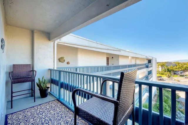 a view of a porch with furniture