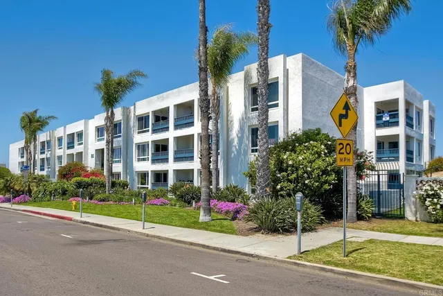 a view of a building with a street