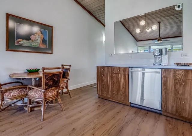 a livingroom with furniture and wooden floor