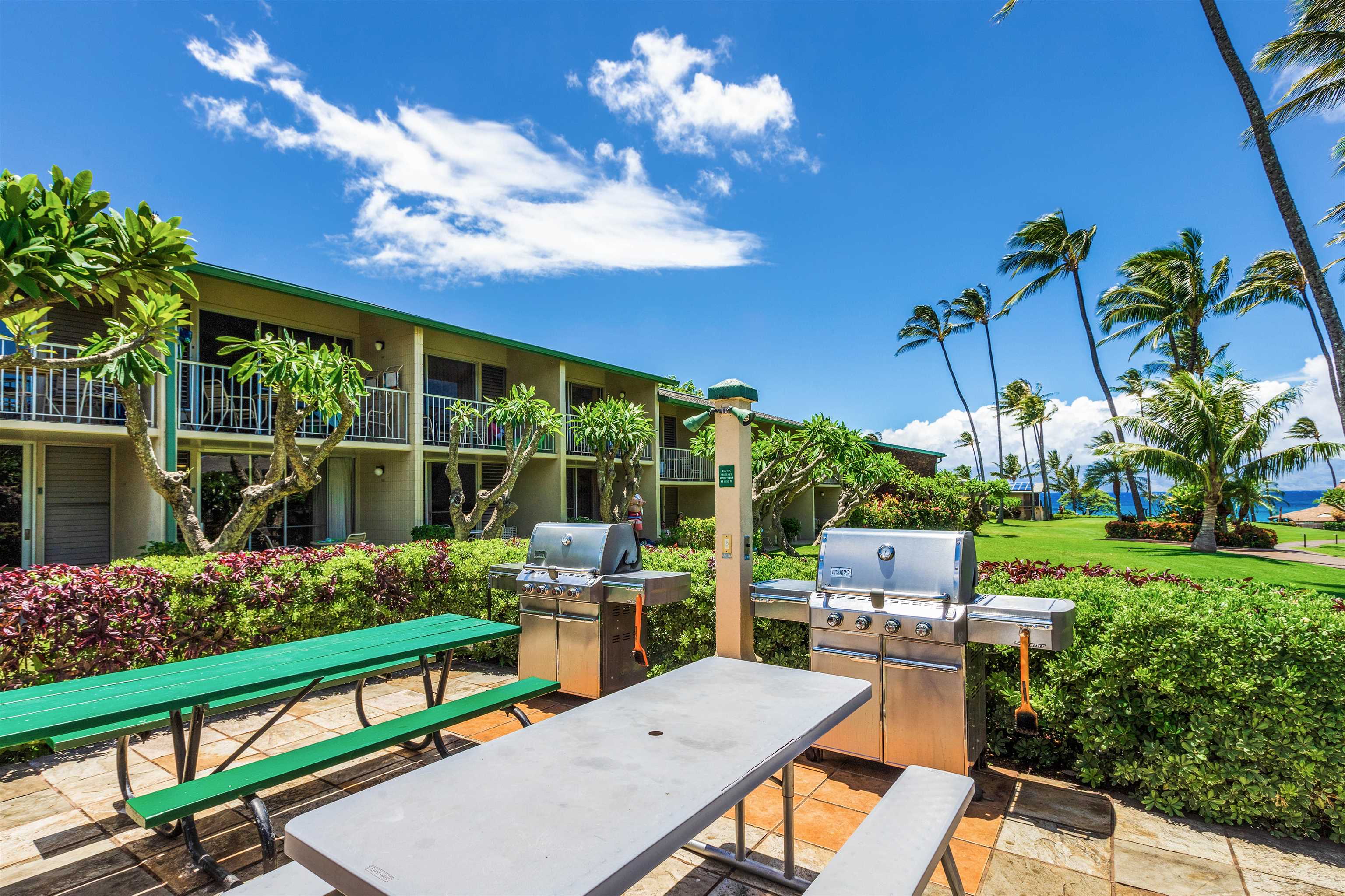 5315 Lower Honoapiilani Road, Unit C217 Lahaina, HI 96761 - Photo 15 of 26 a view of a chairs and table in a patio