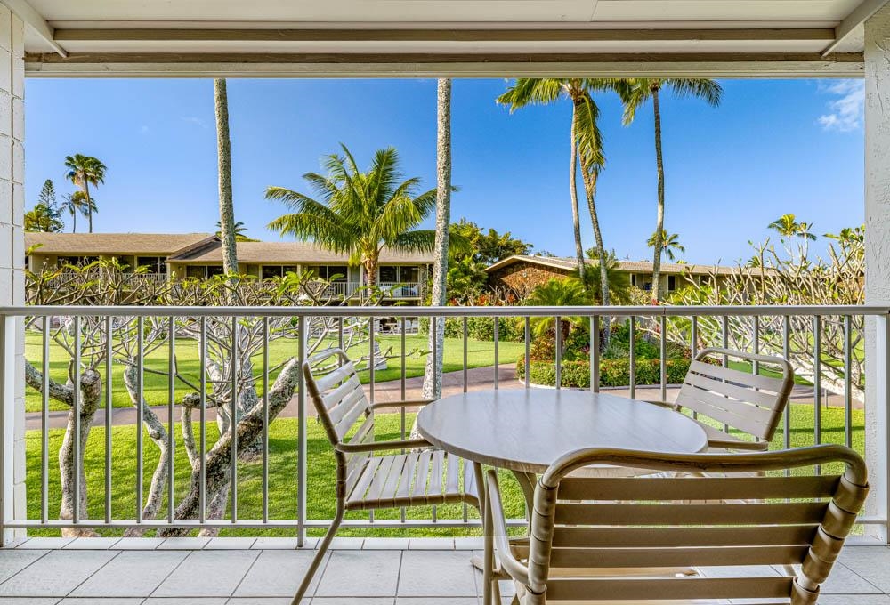 5315 Lower Honoapiilani Road, Unit C217 Lahaina, HI 96761 - Photo 5 of 26 a view of a chairs and table on the terrace