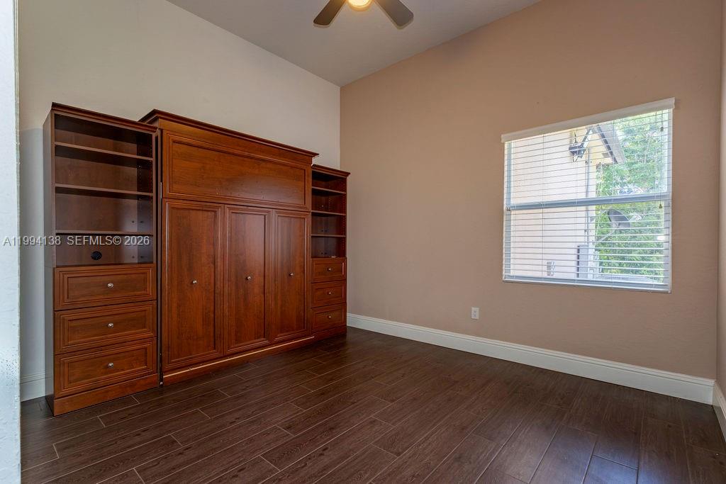 4800 Southwest 141st Avenue Miramar, FL 33027 - Photo 24 of 90 an empty room with wooden floor closet and windows