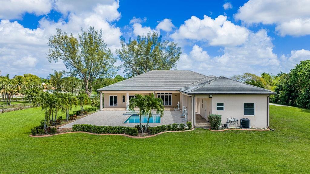 4800 Southwest 141st Avenue Miramar, FL 33027 - Photo 61 of 90 a view of a house with a yard and sitting area