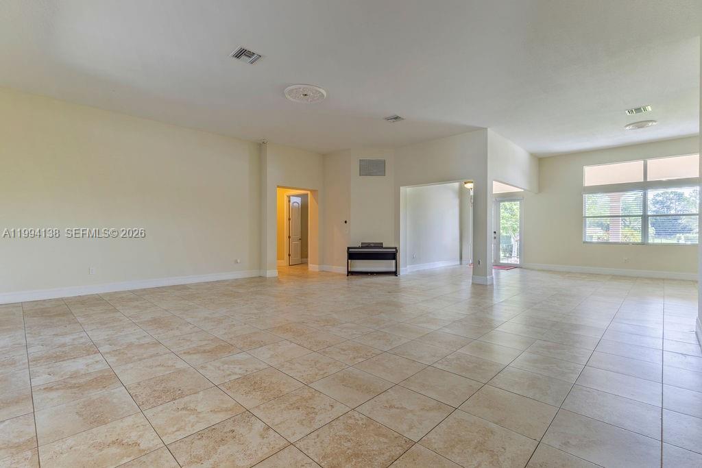 4800 Southwest 141st Avenue Miramar, FL 33027 - Photo 7 of 90 a view of an empty room with a window