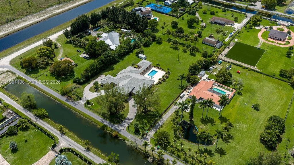 4800 Southwest 141st Avenue Miramar, FL 33027 - Photo 71 of 90 an aerial view of a residential houses with outdoor space
