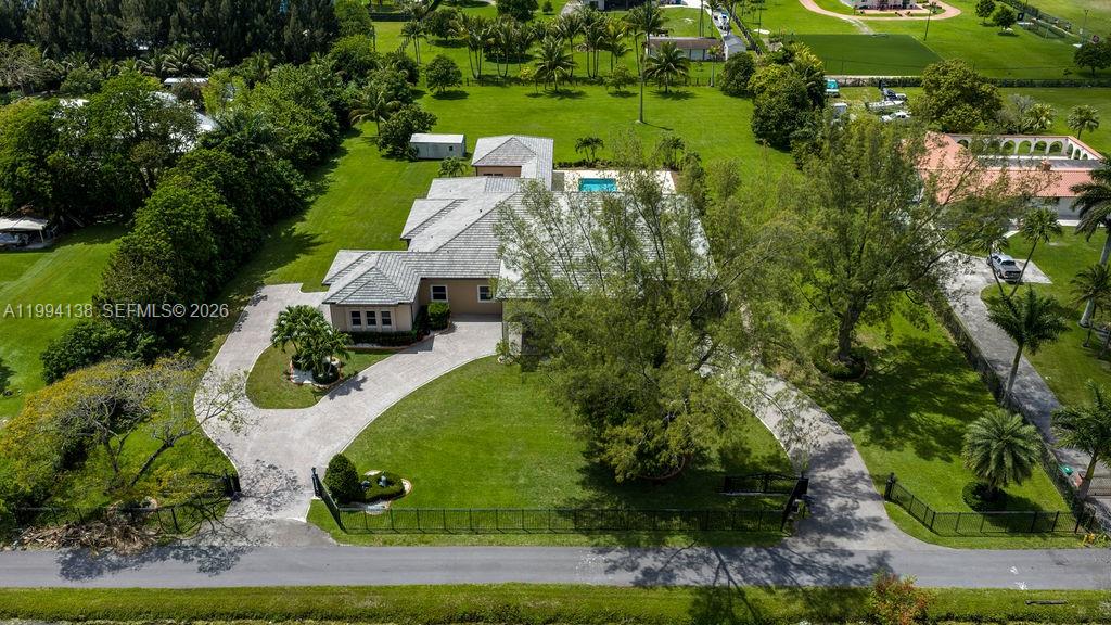 4800 Southwest 141st Avenue Miramar, FL 33027 - Photo 76 of 90 an aerial view of a house with yard