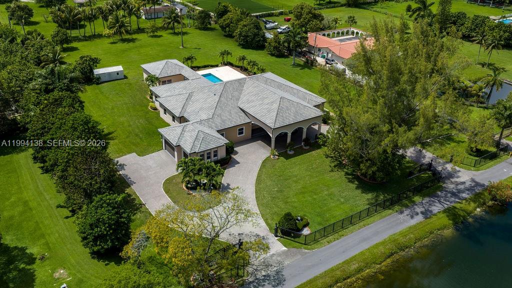 4800 Southwest 141st Avenue Miramar, FL 33027 - Photo 77 of 90 an aerial view of a house with yard swimming pool and outdoor seating