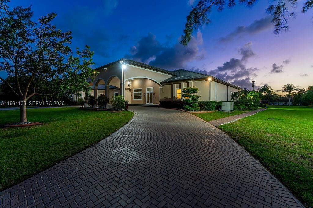 4800 Southwest 141st Avenue Miramar, FL 33027 - Photo 88 of 90 a front view of a house with garden