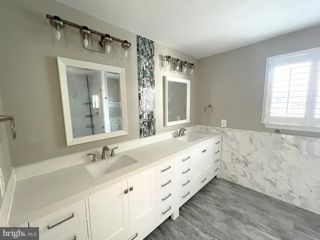 a view of room and wooden floor