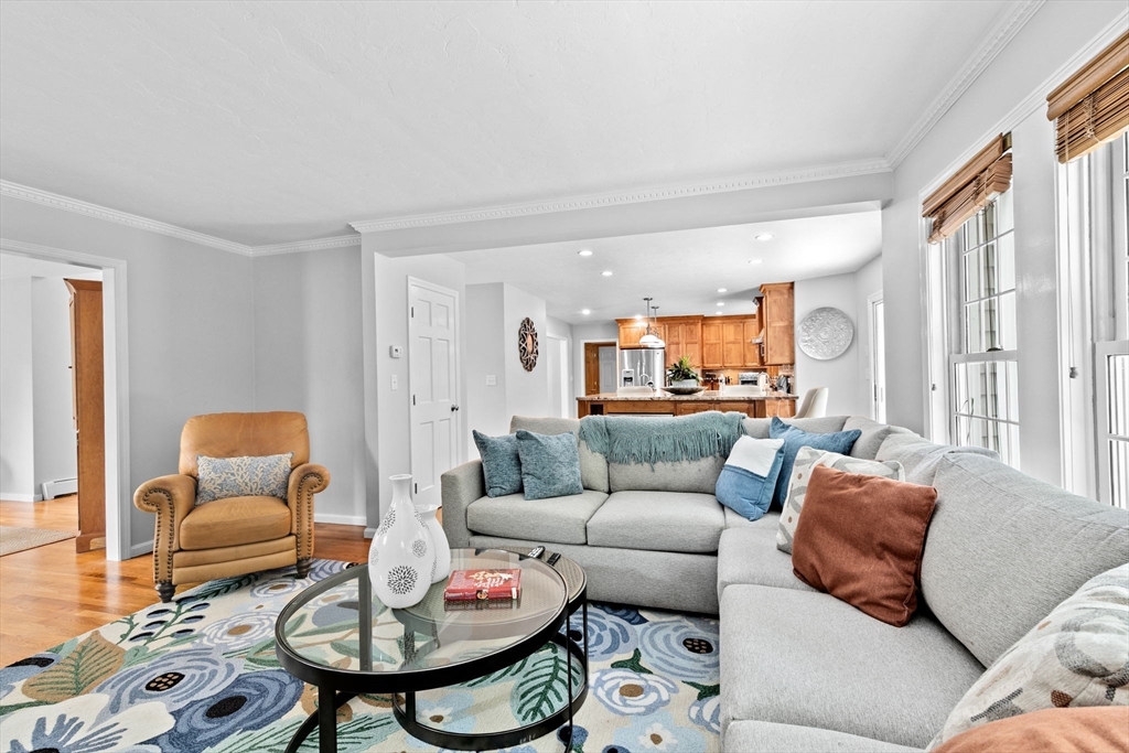 21 Chowdermarch Street Marshfield, MA 02050 - Photo 11 of 39 a living room with furniture and a large window