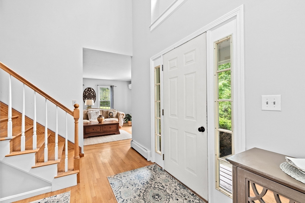 21 Chowdermarch Street Marshfield, MA 02050 - Photo 12 of 39 a living room with furniture and a table