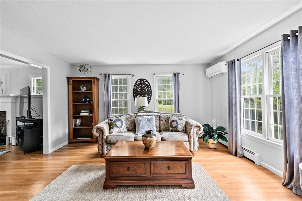 21 Chowdermarch Street Marshfield, MA 02050 - Photo 13 of 39 a living room with furniture and wooden floor