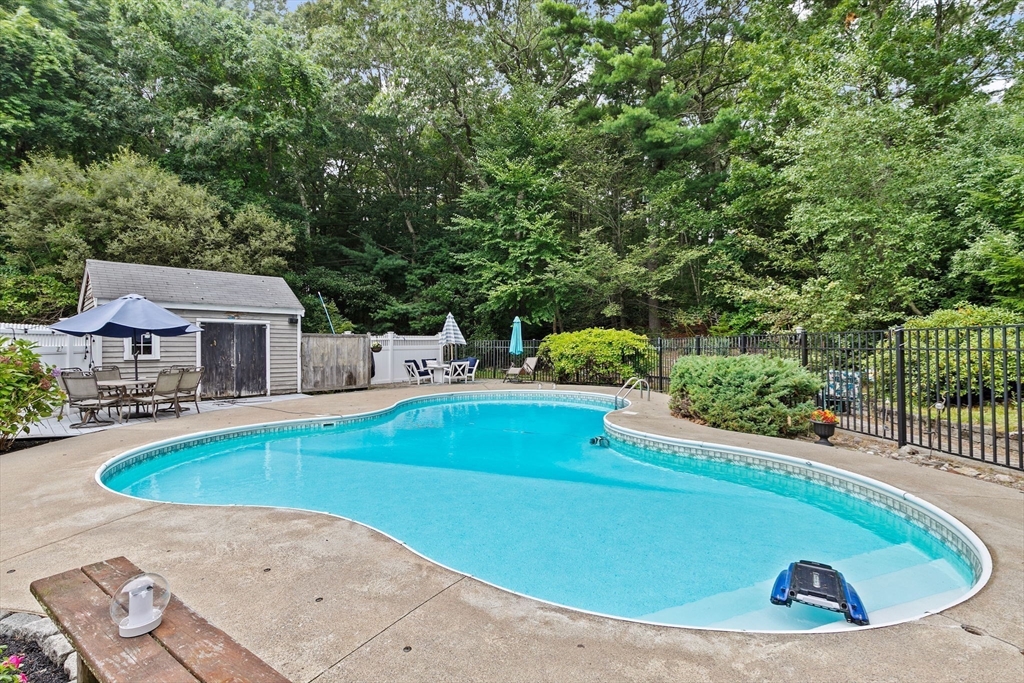 21 Chowdermarch Street Marshfield, MA 02050 - Photo 31 of 39 a view of a swimming pool with a patio