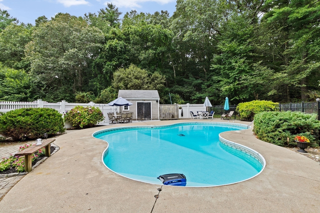 21 Chowdermarch Street Marshfield, MA 02050 - Photo 33 of 39 a view of a swimming pool with a patio