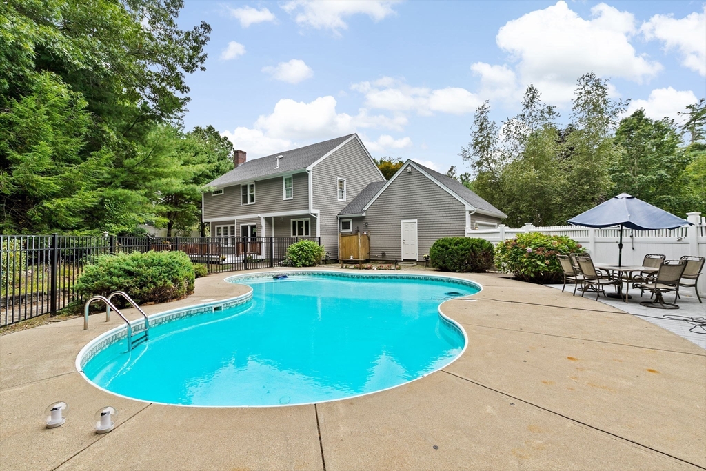21 Chowdermarch Street Marshfield, MA 02050 - Photo 34 of 39 a view of a house with swimming pool and sitting area