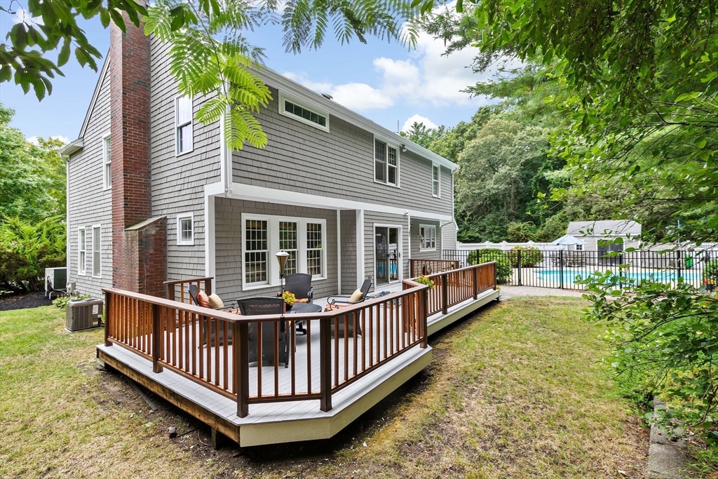 21 Chowdermarch Street Marshfield, MA 02050 - Photo 36 of 39 a view of a house with backyard and porch
