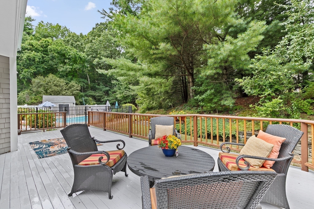 21 Chowdermarch Street Marshfield, MA 02050 - Photo 37 of 39 an outdoor sitting area with furniture and wooden floor