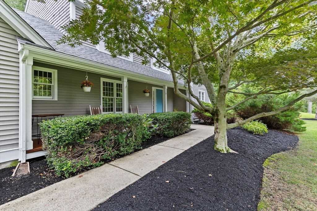 21 Chowdermarch Street Marshfield, MA 02050 - Photo 38 of 39 a front view of a house with garden
