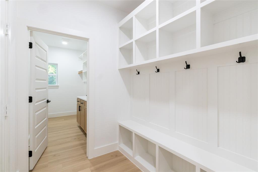 6131 Inca Drive Mabank, TX 75156 - Photo 15 of 21 a view of walk in closet with empty racks