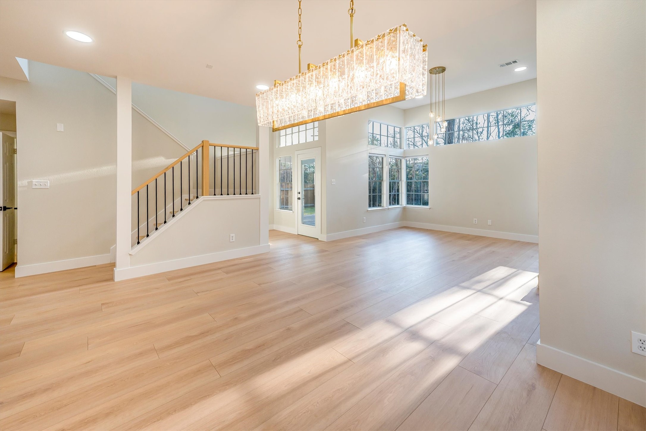 235 South Crimson Clover Circle Spring, TX 77381 - Photo 11 of 22 a view of entryway and hall with wooden floor