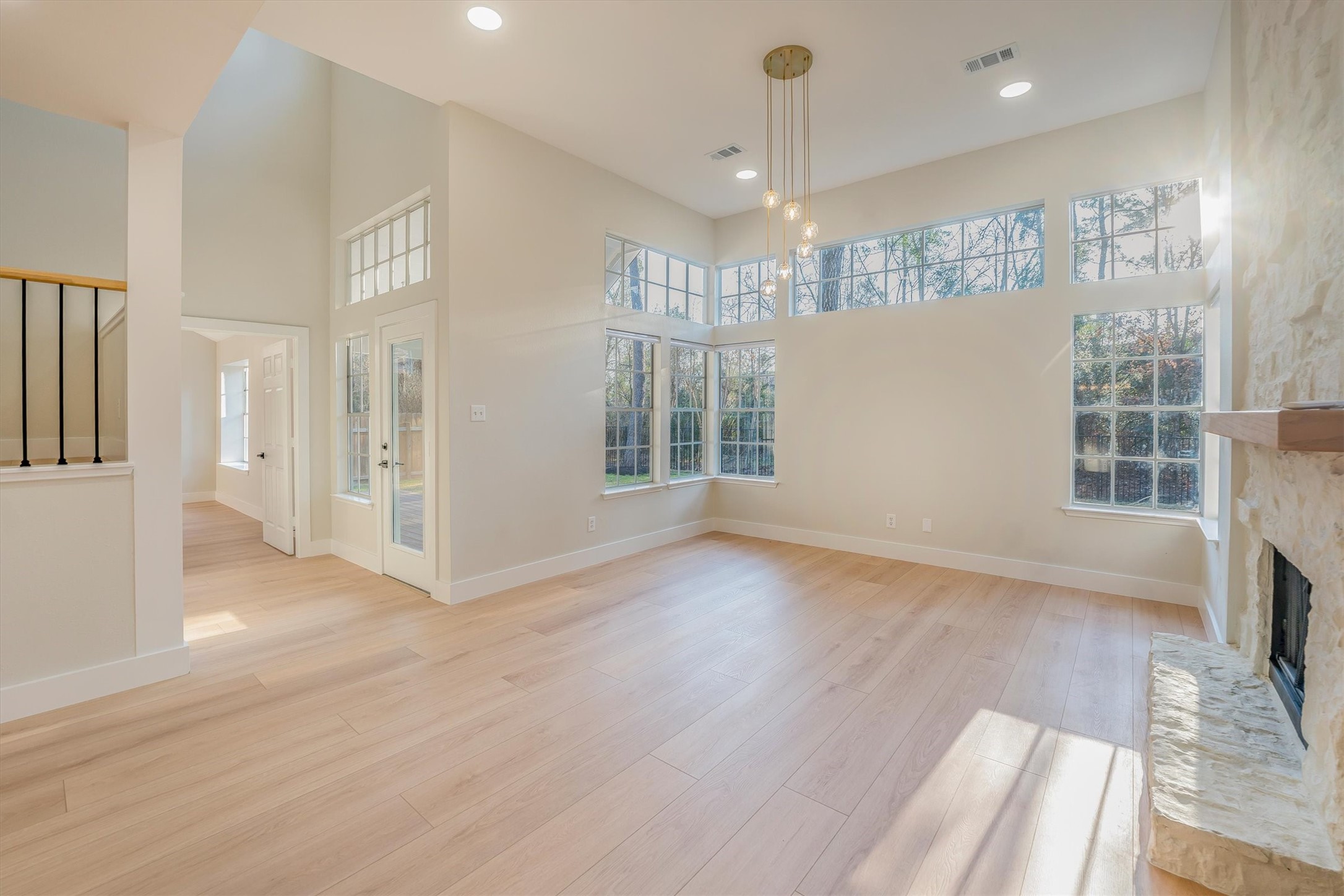 235 South Crimson Clover Circle Spring, TX 77381 - Photo 12 of 22 an empty room with wooden floor and windows