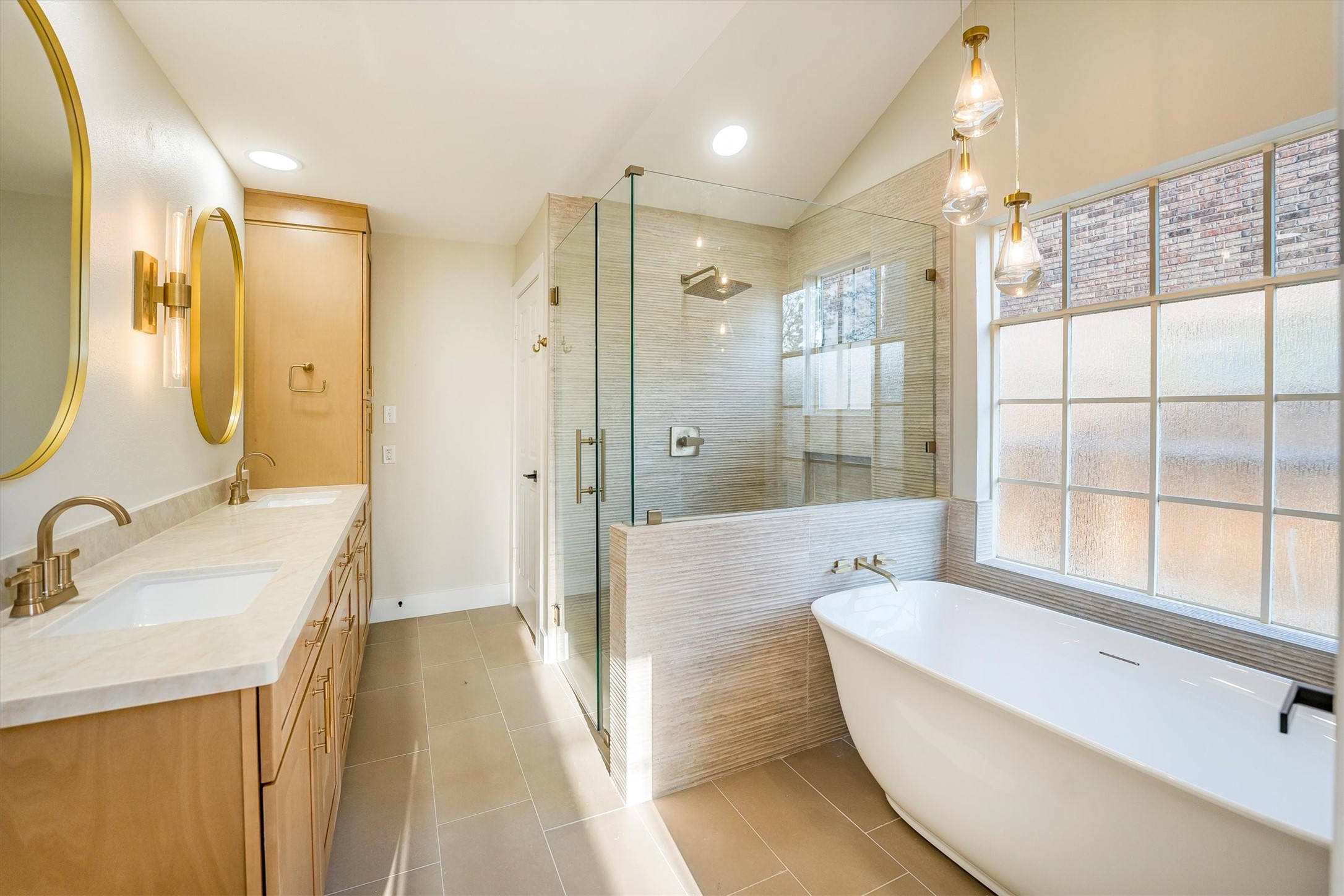 235 South Crimson Clover Circle Spring, TX 77381 - Photo 15 of 22 a bathroom with a tub sink shower and mirror