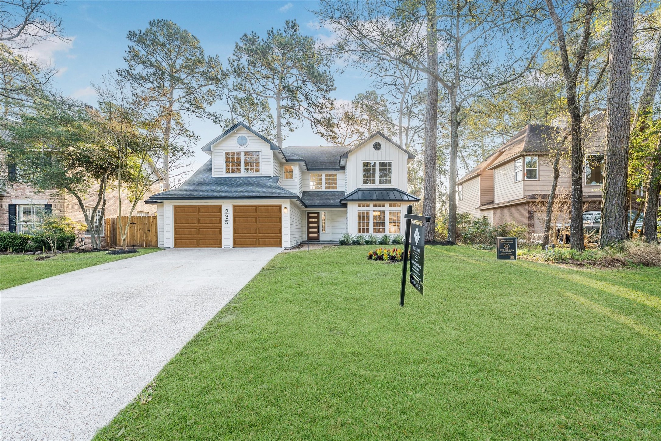 235 South Crimson Clover Circle Spring, TX 77381 - Photo 2 of 22 a front view of a house with a yard