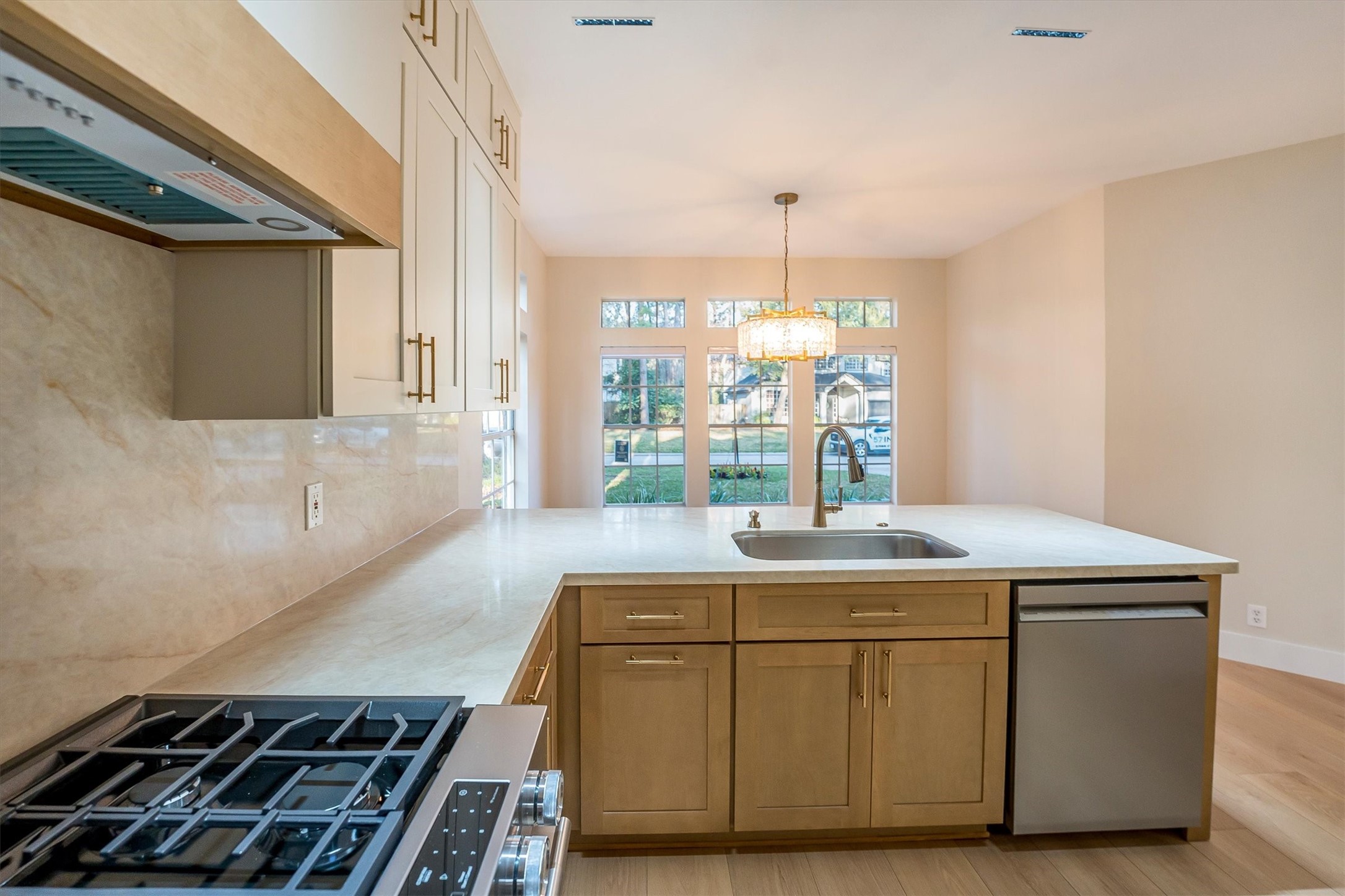 235 South Crimson Clover Circle Spring, TX 77381 - Photo 8 of 22 a room with washing machine and wooden floor