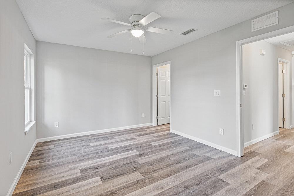 2885 North 8th Street St. Augustine, FL 32084 - Photo 19 of 35 a view of room with window and ceiling fan