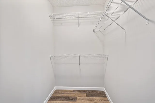 a view of a room with racks on the wall